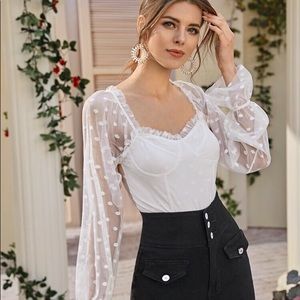 White polka dot bodysuit